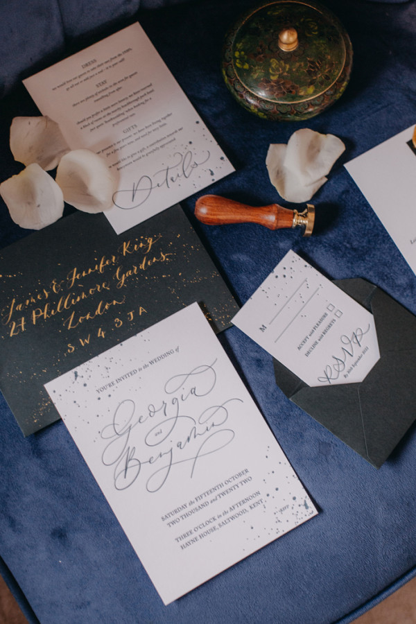 Black and gold wedding stationery